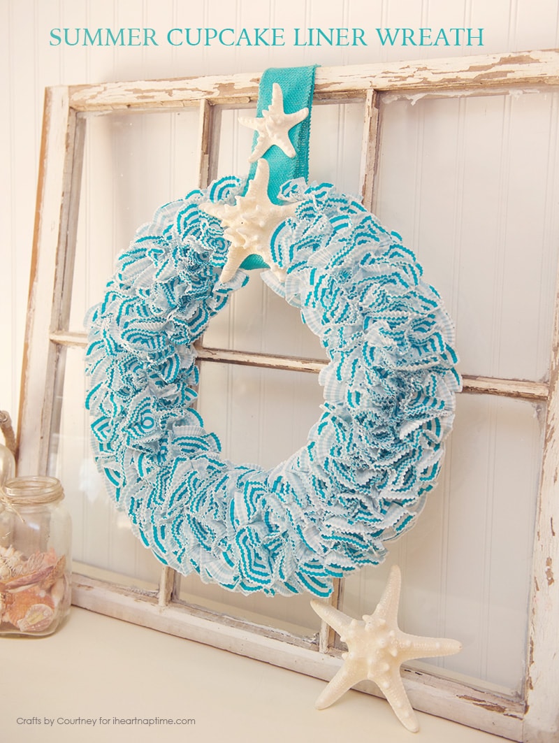 Create a fun Summer Wreath using cupcake liners!! It’s so easy and looks perfect for any Summer decor. I added a couple seashells to finish off with a coastal look.