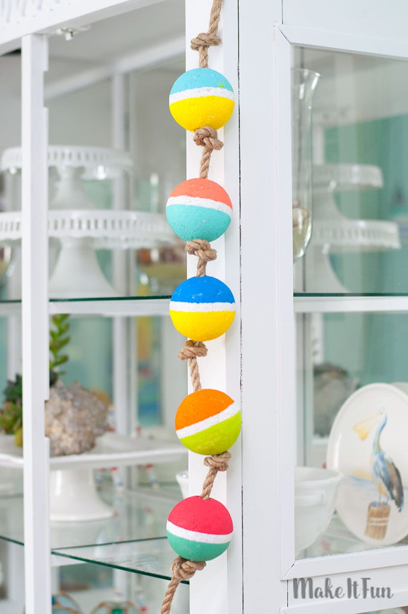 Create this simple foam Buoy Garland for a nautical themed room.