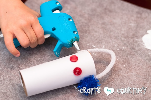 Christmas Craft: Toilet Paper Roll Snowmen: Hot Glue Your Pipe Cleaner for Ear Muffs