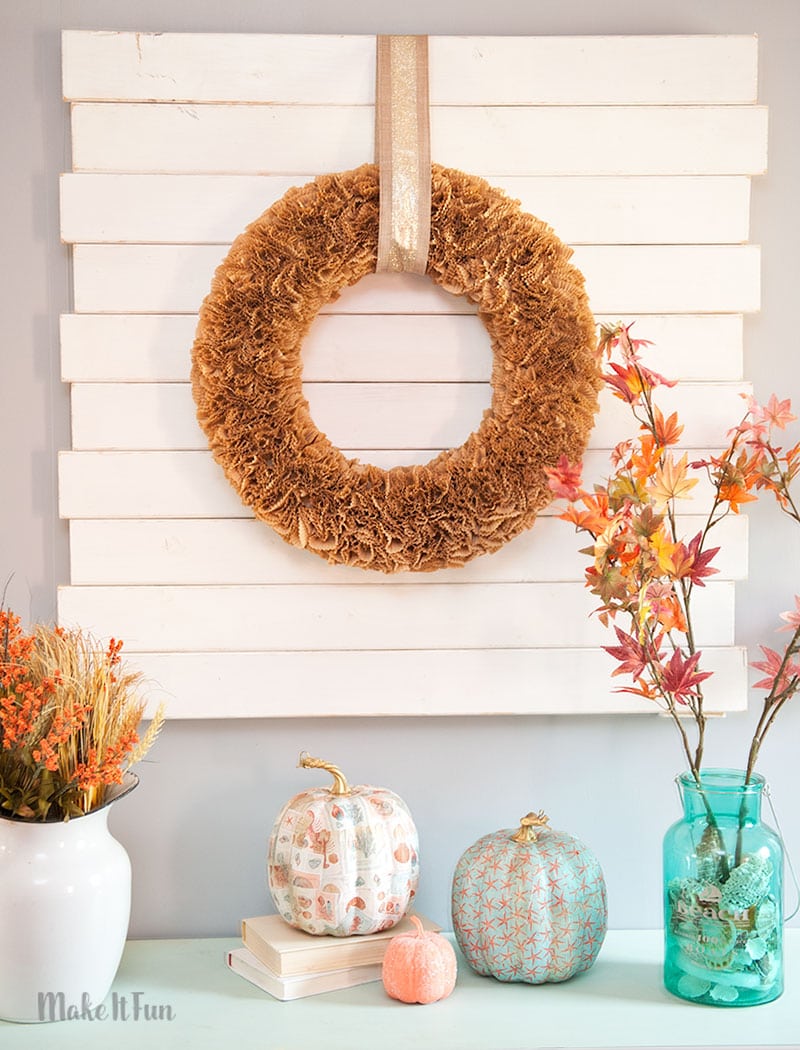 Create a simple DIY wreath for Fall using only cupcake liners.  They are so pretty and easy to use.  I think this Fall wreath is perfect to keep up from September to November for your Fall decor! 